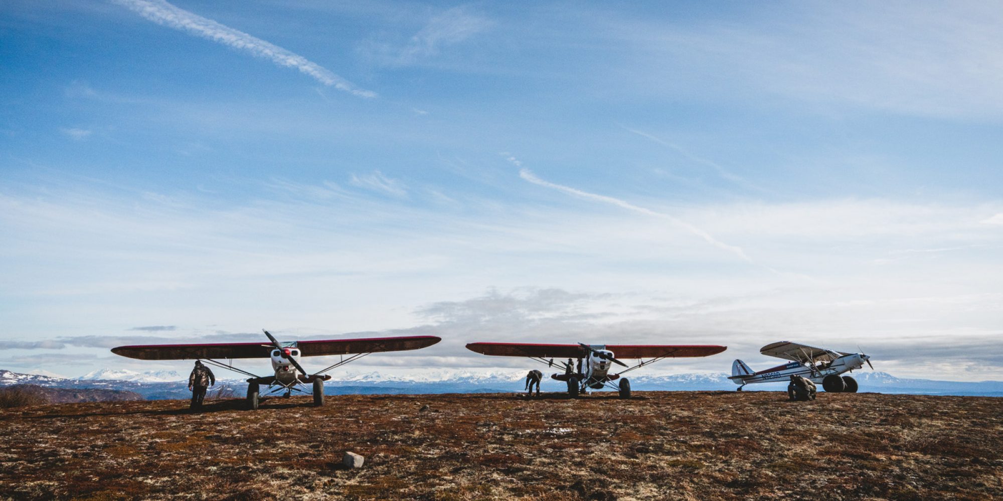 3 planes on the ground